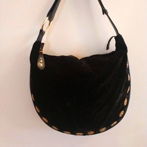 Maxx black Velvet gold studded shoulder bag.